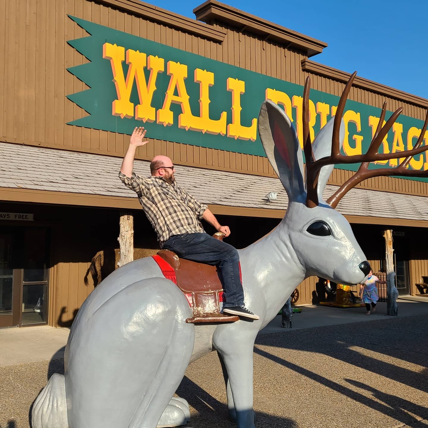 Me, riding a giant plastic(?) jackalope at Wall Drug